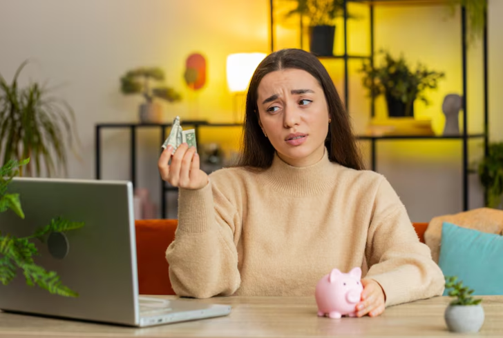 Woman thinking before spending